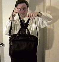 Strap is through the
handle.